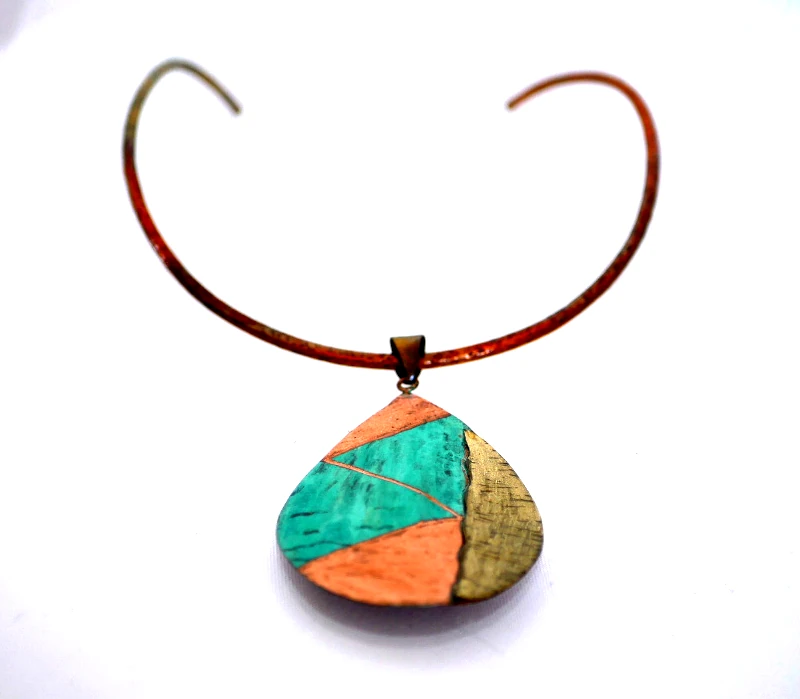 Big Bronze Drop Necklace With irregular Textures and Lateral metal - Image 3
