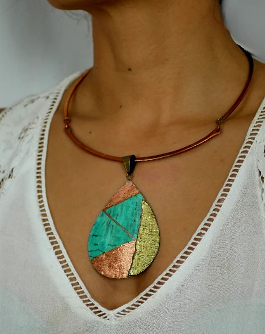 Big Bronze Drop Necklace With irregular Textures and Lateral metal - Image 2