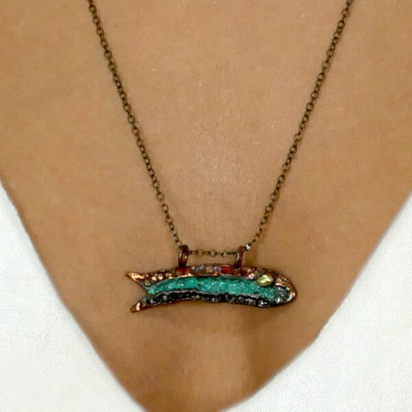 women's fish necklace.