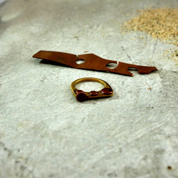 sustainable and eco-friendly jewelry Ring made from a recycled bronze cylinder