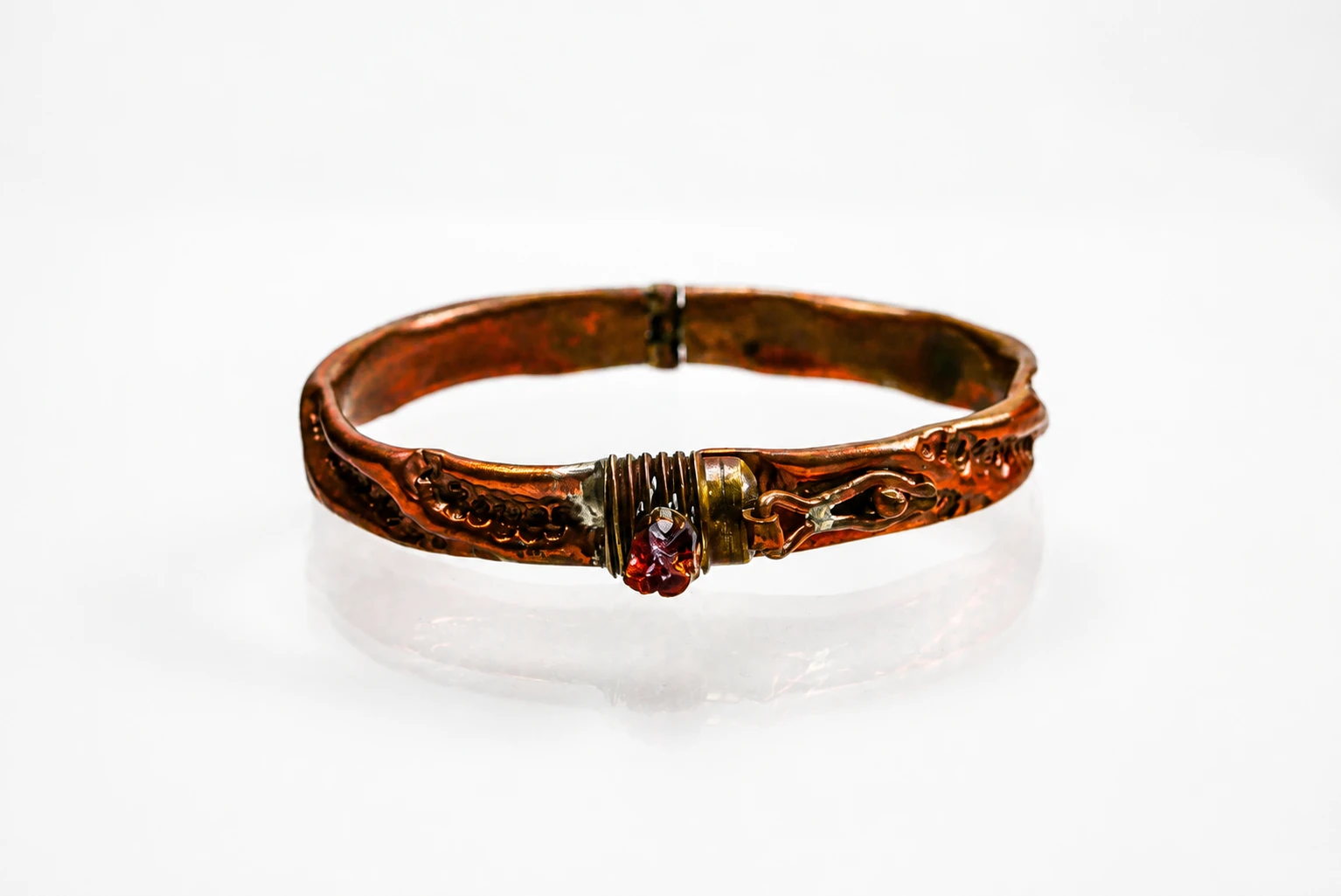 Handcrafted Air Chasing bracelet made from reclaimed copper with rustic topaz and hand-chased textures.