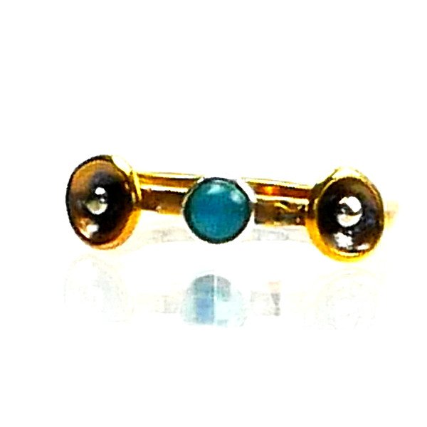 Slim handmade square ring in reclaimed metal with a silver bezel, turquoise stone, copper cone details, and small silver accents