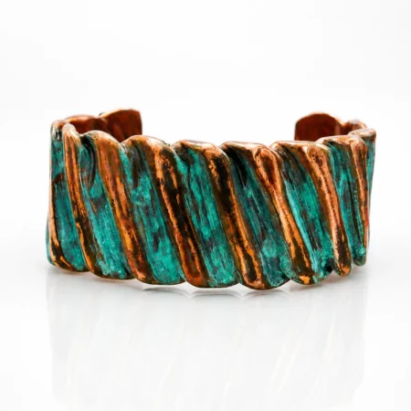 rustic Copper cuff bracelet handcrafted from reclaimed flexible refrigeration tubing with bronze accents and turquoise patina.
